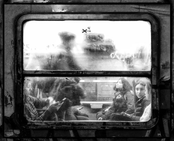 people from the window of a train
